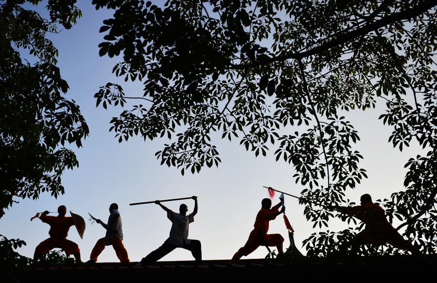 Monks practice martial art at Quanzhou Shaolin Temple