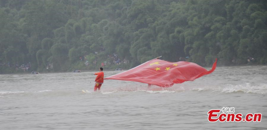 Waterskiing stunt performance at cultural festival