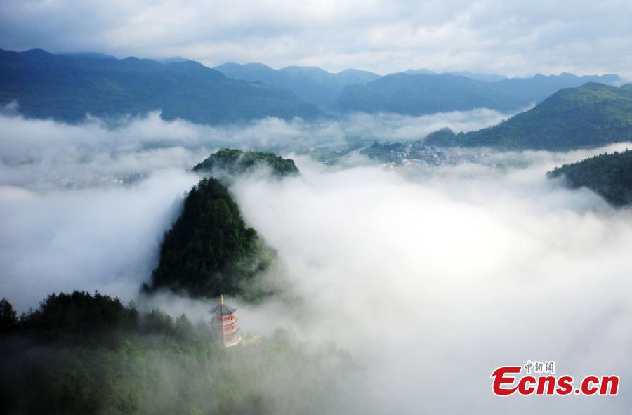 Clouds and fog create remarkable mountain scene