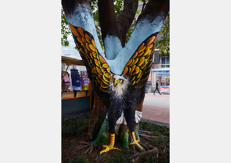 Vivid tree graffiti decorates downtown Chongqing