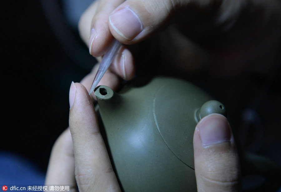 'Reserved lady': Chaozhou handmade red clay teapot