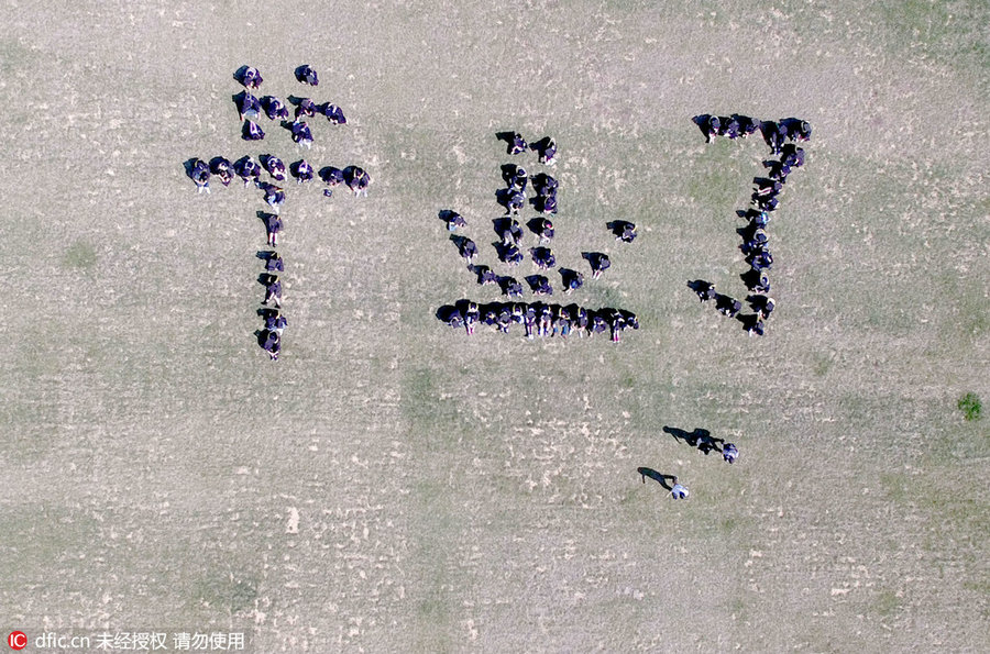 Students pose for special group photos to mark graduation