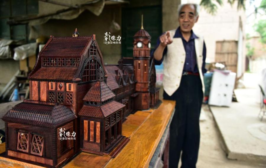 Retiree spends nearly three years carving iconic railway station