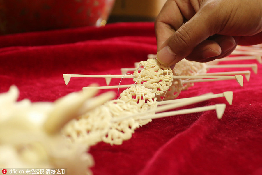 Bone sculpture: A centipede kite with dragon head