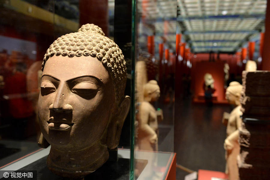 Chinese and Indian sculptures on display at the Palace Museum in Beijing