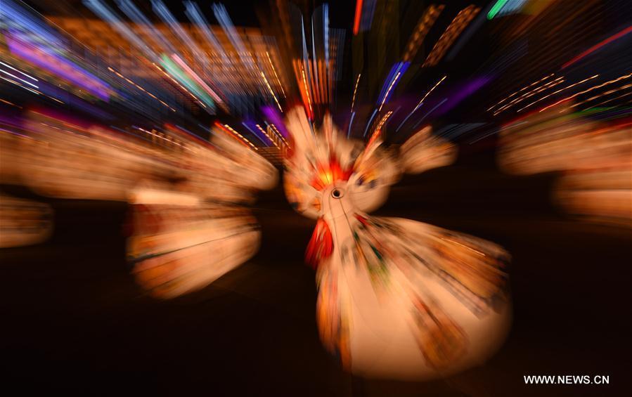 Lanterns in shape of rooster seen in NW China