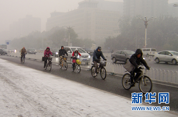 北京飄落今冬首場雪預計中午結束