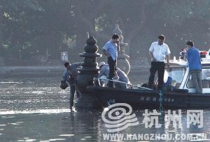 三潭印月石塔連夜修復 今后游客拍照須保持距離