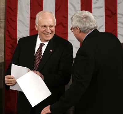 U.S. Vice President Dick Cheney (L) smiles as he talks with Dennis Hastert, Speaker of the U.S. House of Representatives, after Cheney made official the results of the Joint Session of Congress verifying the official Certificate of Electoral Votes from the 2004 U.S. Presidential election, on the House Chambers floor on Capitol Hill, January 6, 2005. U.S. Rep. Stephanie Tubbs Jones protested the results for Ohio and delayed continuation of the proceeding, which resumed with the a vote against the protest. [Reuters]