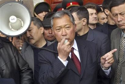 Kyrgyzstan's interim leader Kurmanbek Bakiyev speaks outside the parilament in Bishkek, Monday, March 28, 2005. Bakiyev recognized Kyrgyzstan's new parliament as legitimate Monday, seeking to end a struggle between rival legislatures that has threatened to spark new unrest after last week's ouster of President Askar Akayev. (AP Photo/Sergei Grits