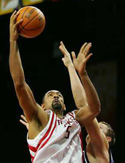 Houston Rockets forward Juwan Howard announced April 7, 2005 that he will miss the remainder of the season due to a viral infection in his heart. Howard had been sidelined with a sprained right knee and was hoping to return for the playoffs. Howard is shown in action October 14, 2004. [Reuters] 