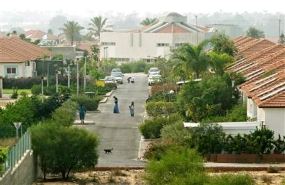 A general view of Neve Dekalim settlement, within the Gush Katif block of Jewish settlements, in the Gaza Strip, is seen in this Oct. 27 2004 file photo. Israel's defense minister Shaul Mofaz decided Thursday, April 7, 2005, not to destroy homes in Jewish settlements in the Gaza Strip during an Israeli withdrawal from the area this summer, security officials said. The decision was made in a meeting with top Israeli security officials, and still requires Cabinet approval. (AP Photo/Ariel Schalit) 