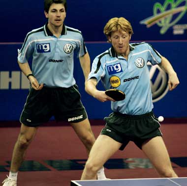 Timo Boll and Christian Suss of Germany return the ball at the men's doubles final against Kong Linghui and Wang Hao of China at the 48th World Table Tennis Championship in Shanghai, China, May 5, 2005. China won the match 4-1.