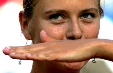 Russia's Maria Sharapova reacts at the end of her tennis match against compatriot Elena Bovina during the Italian Masters tennis tournament in Rome May 13, 2005. Sharapova won the match 6-2 6-2. REUTERS