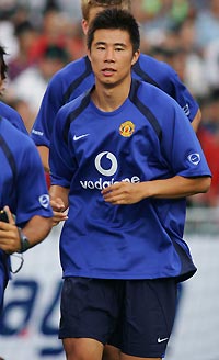 Manchester United's Chinese soccer player Dong Fangzhuo takes part in a training session in Hong Kong July 22, 2005.