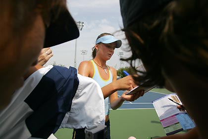 Daniela Hantuchova of Slovakia hits a return to Camille Pin of France during their match at the U.S. Open tennis tournament in Flushing Meadows, New York, August 29, 2005. Hantuchova defeated Pin by 6-3 6-1. 