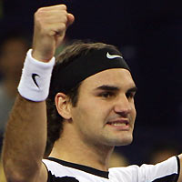 oger Federer of Switzerland reacts after wining his match against Ivan Ljubicic of Croatia in the Tennis Masters Cup in Shanghai, China November 15, 2005.