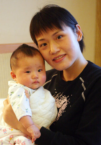 NPC deputy Xu Hongyan and her 3-month baby