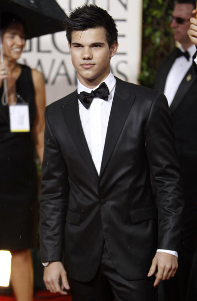 Taylor Lautner arrives at the 67th annual Golden Globe Awards