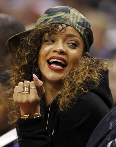 Rihanna enjoys NBA game