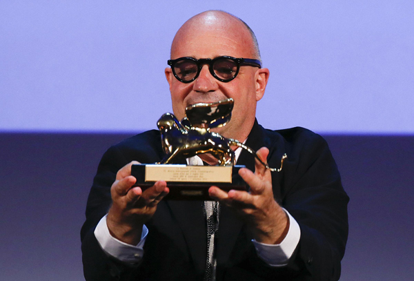 Italian director Gianfranco Rosi wins Golden Lion Award