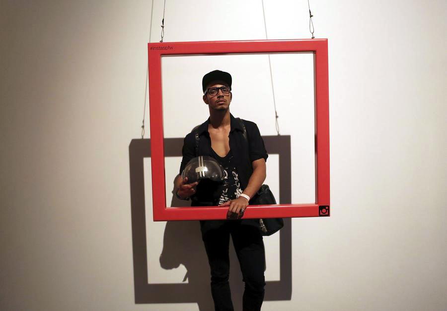 Fashionistas pose during Sao Paulo Fashion Week