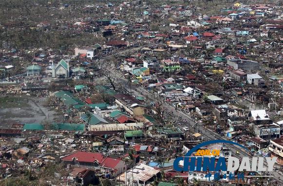 菲律賓災民搶劫米倉 墻體倒塌8人死亡