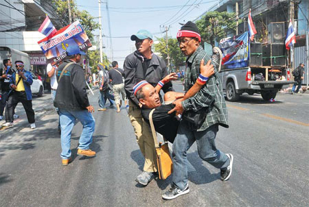 Dozens of protesters hurt in Bangkok blast