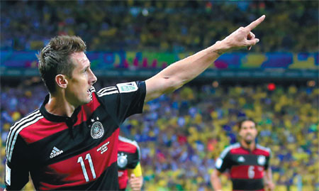 Soft-spoken Klose sets scoring record