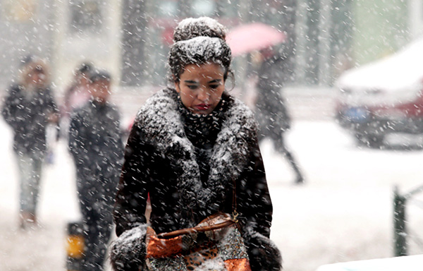 Cold wave brings snow, wind, rain to much of nation