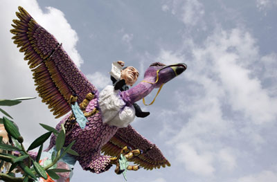 Carnival float depicting Italian PM Berlusconi