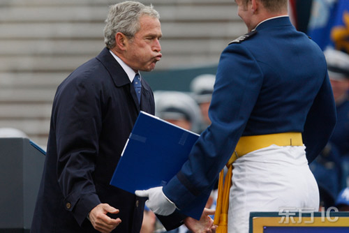 Bush plays chest-bumping with Air Force cadet