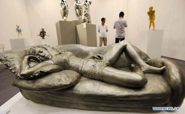 Creative statues displayed at Beijing Art Expo