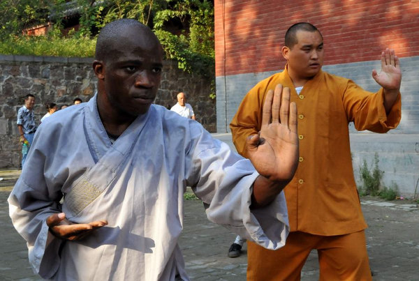 African apprentices practise kungfu at Shaolin Temple