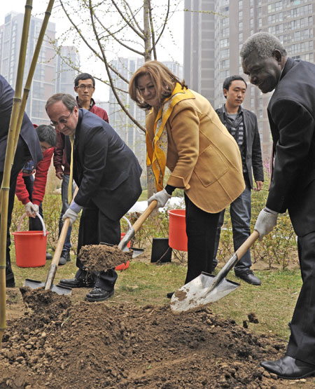 Envoys dig in at Earth Day bamboo garden