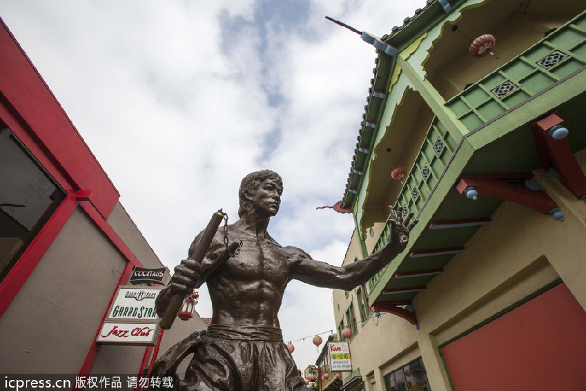 Bronze statue of kung fu star Bruce Lee on display in LA