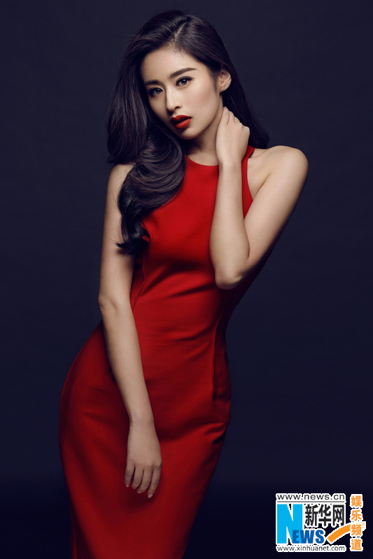 Actress Ying Er poses in red dress to welcome Year of the Monkey