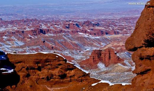 In pics: snow scenery of Danxia landform in NW China's Gansu