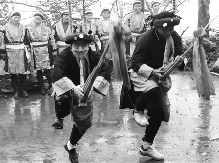 Master of an ancient Miao folk dance