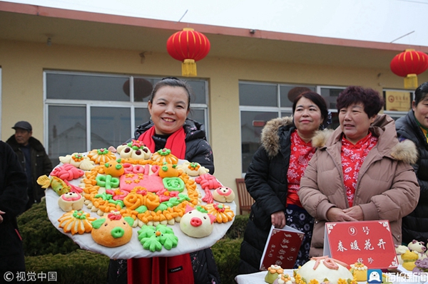 Steamed bun making competition held in Rizhao