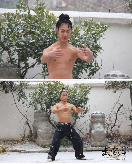 Bare-chested Wudang disciples practice kung fu in the snow