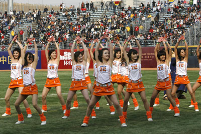 Cheerleaders perform during the second game between San Diego Padres and Los Angeles Dodgers in the 2008 Major League Baseball (MLB) China Series at Wukesong Baseball Field in Beijing March 16, 2008. 