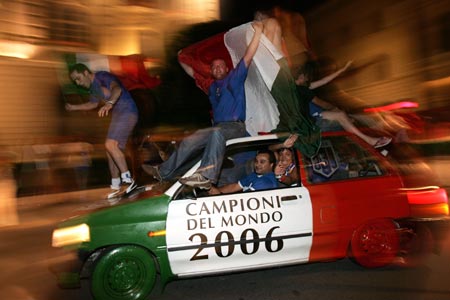 Italian fans in Berne celebrate Italy's victory over France after the World Cup 2006 final soccer match July 9, 2006.