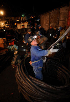 Rescue continues for workers trapped in flooded mine