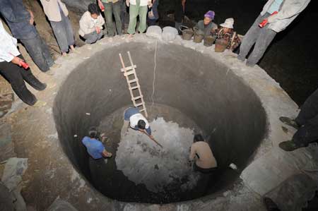 Villagers work around the clock for water