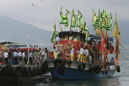 People celebrate Tin Hau festival in Hong Kong