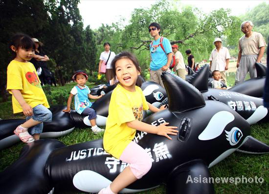 Kids release 'whales' in Beijing