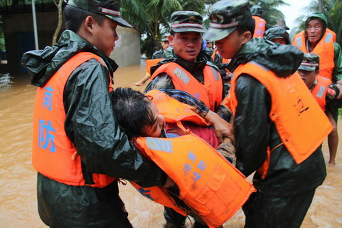 Mass evacuation in flood-hit Hainan