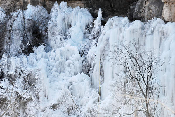 Grand ice fall on mountain cliffs in N China