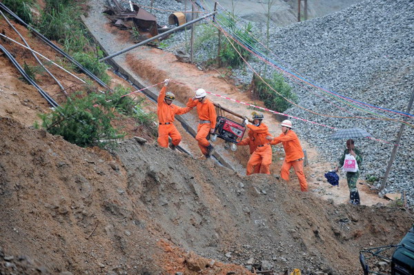 Death toll in S China landslide rises to 19